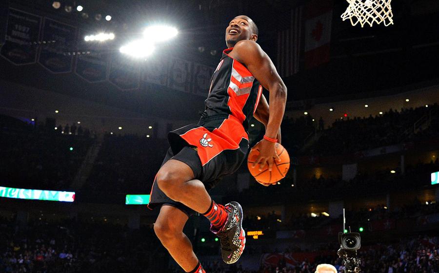 Player jumping to basket